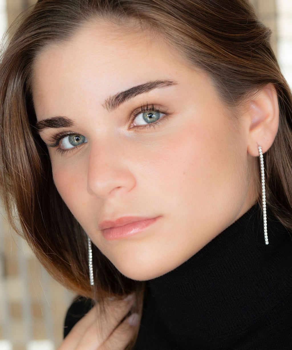 Pendientes riviere de plata rodiada, o con baño de oro 18k, con circonitas blancas de 2 mm y 3 o 7 cm de largo.