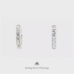 Pendientes de aro tipo criolla de plata rodiada y circonitas blancas, un básico versátil y cómodos de LAURENSONS