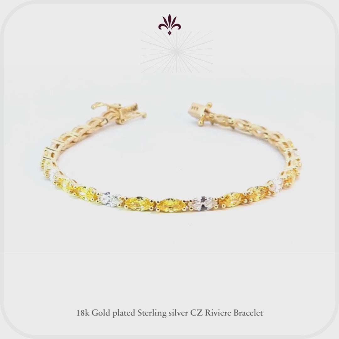 Pulsera riviere de plata con baño de oro amarillo y circonitas blancas y amarillas talla marquesa  de LAURENSONS
