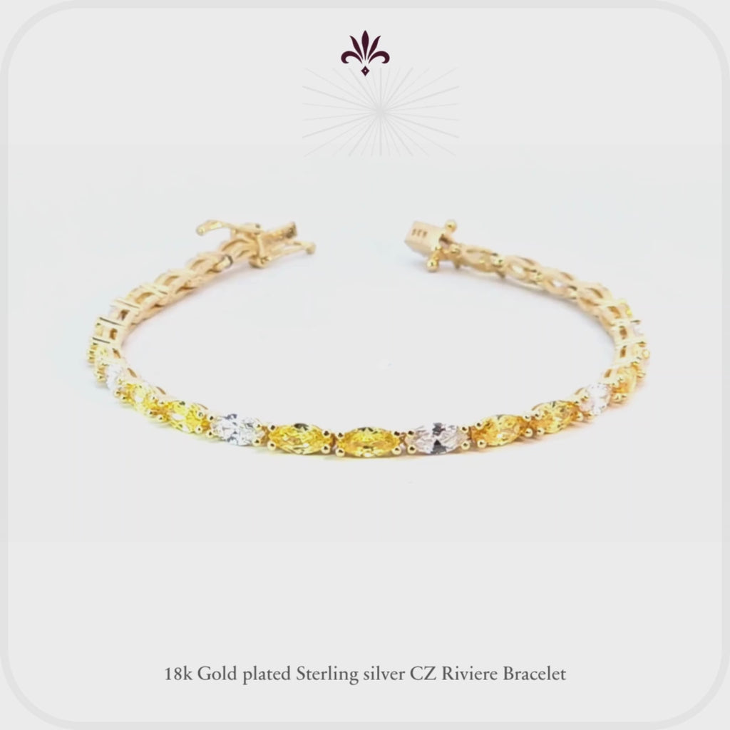 Pulsera riviere de plata con baño de oro amarillo y circonitas blancas y amarillas talla marquesa  de LAURENSONS