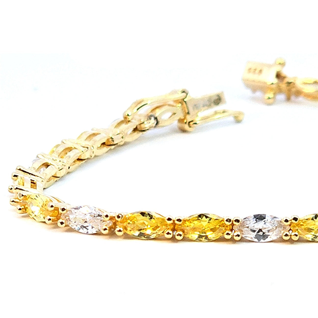 Pulsera riviere de plata con baño de oro amarillo y circonitas blancas y amarillas talla marquesa  de LAURENSONS