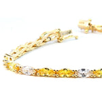 Pulsera riviere de plata con baño de oro amarillo y circonitas blancas y amarillas talla marquesa  de LAURENSONS