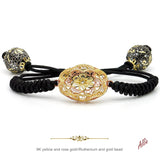 Pulsera de macramé negro con medallón de oro 9K y circonitas