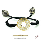 Pulsera de macramé negro con roseta calada en oro 9K