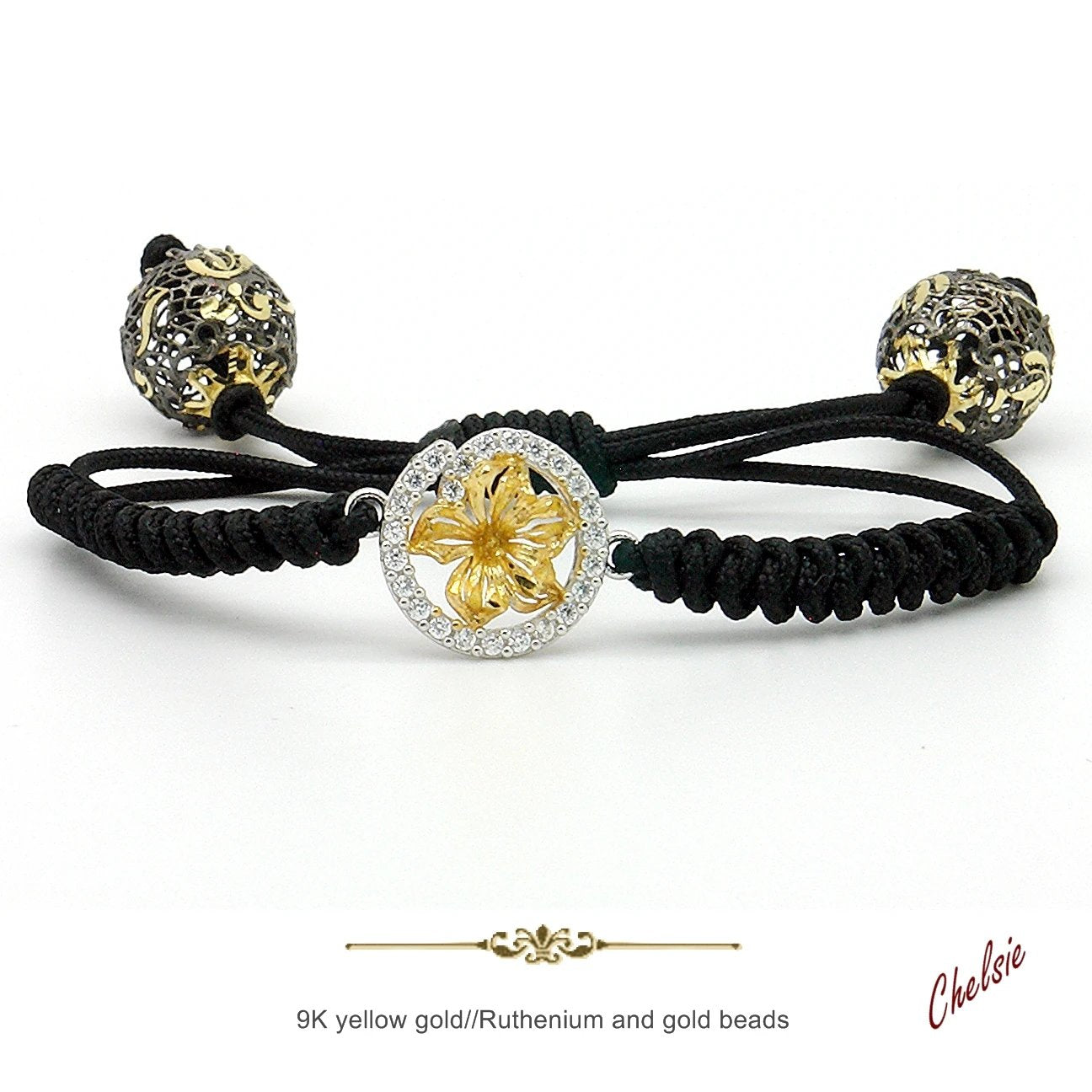 Pulsera de macramé negro con estrella de oro 9K y circonitas