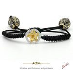 Pulsera de macramé negro con estrella de oro 9K y circonitas