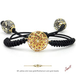 Pulsera de macramé negro con esfera de filigrana en oro 9K